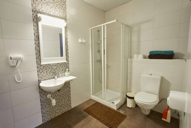 Banheiro compartilhado do apartamento Garden View